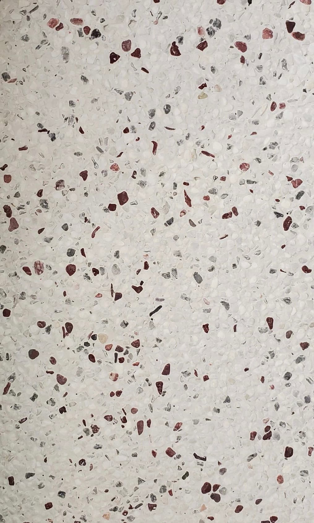 Terrazzo-style tiles for commercial floors and wet areas.